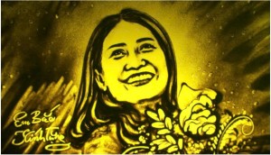 Vẽ chân dung bằng cát 